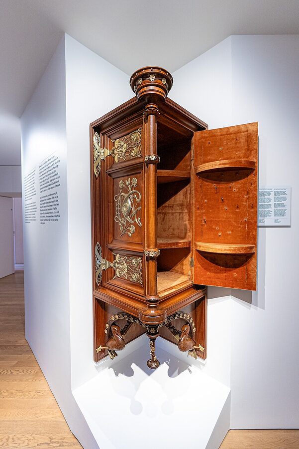 Casa Vicens walnut corner cabinet with D.G. initials for Dolors Giralt