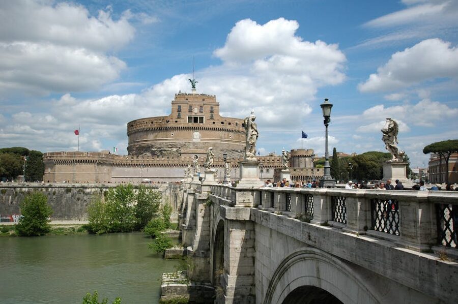 Castel SantAngelo and Bridge of Angels with dramatic clouds