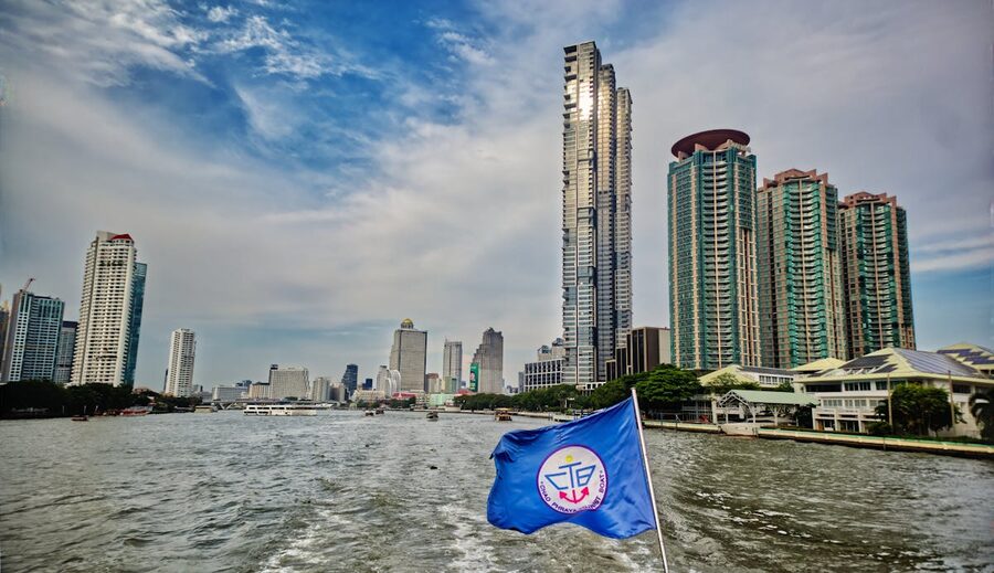 Scenic view of Bangkok skyline from a river ferry on the Chao Phraya River