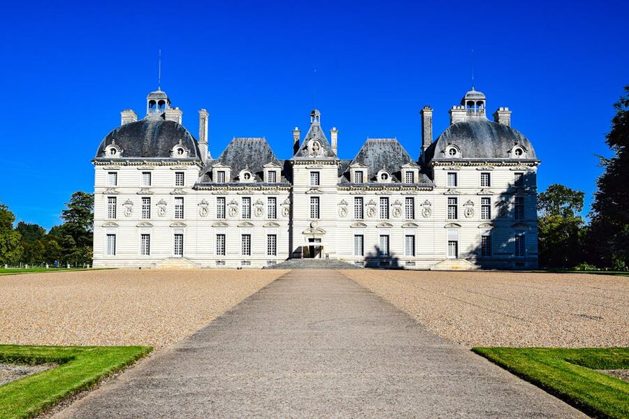 Chateau de Cheverny under clear blue sky