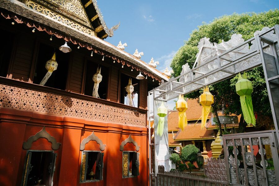 Thai temple architecture decorated with colorful lanterns in Chiang Mai Thailand