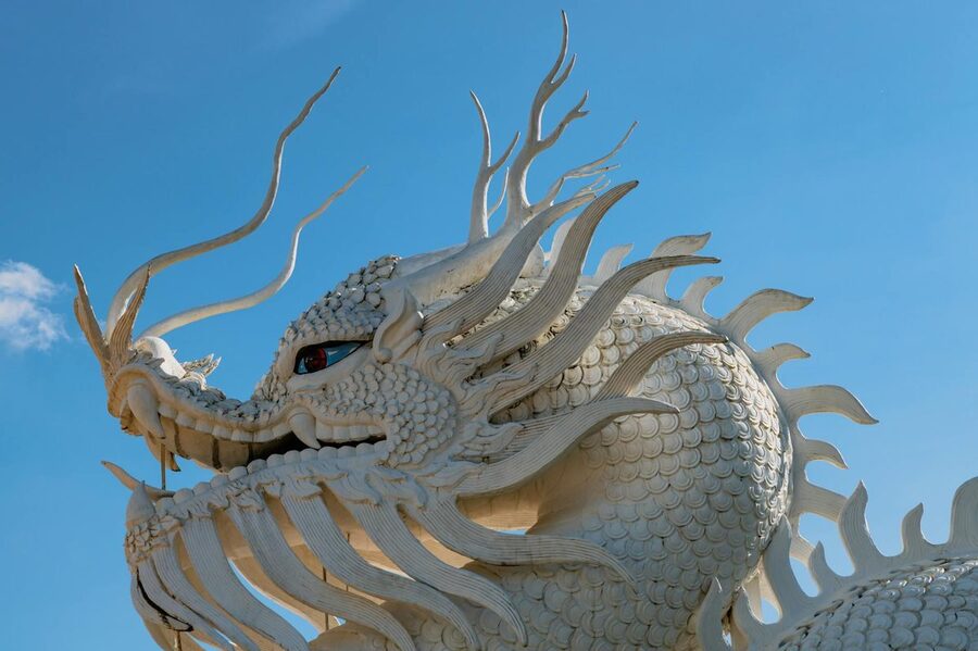 White dragon sculpture at a temple in Chiang Rai Thailand