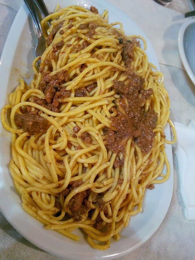 Pici pasta with wild boar ragu at a Tuscan winery lunch