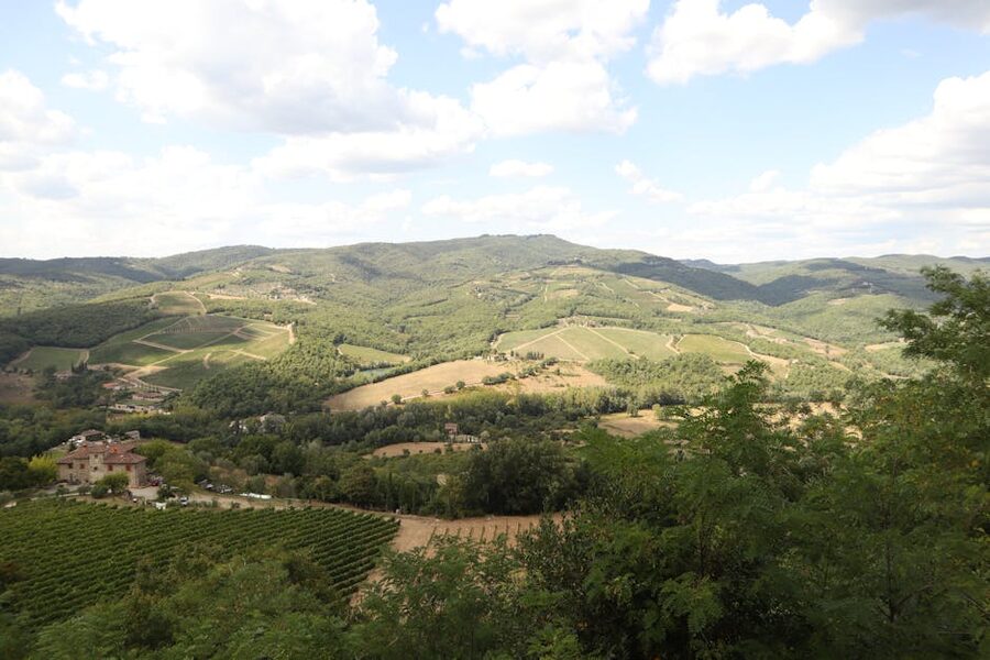 Aerial view of Tuscany rolling hills and Chianti vineyards