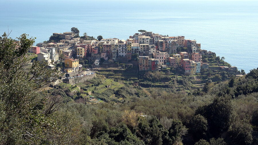 Corniglia village on hilltop seen from coastal trail