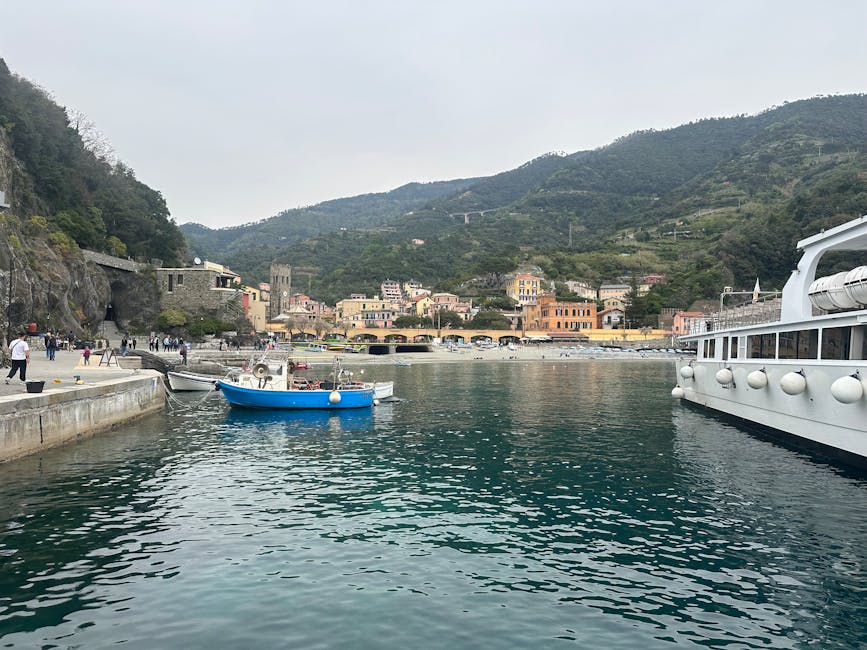 Monterosso al Mare harbor with boats and colorful buildings