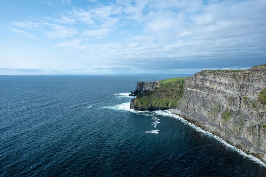 Aerial view of the Cliffs of Moher in County Clare with the Atlantic Ocean below
