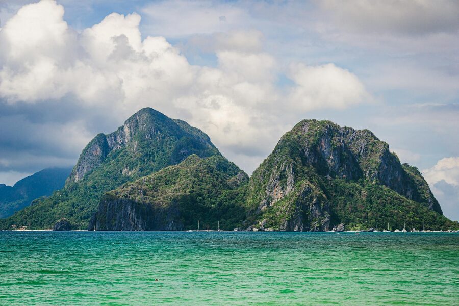 Dramatic limestone cliffs rising from the sea in El Nido