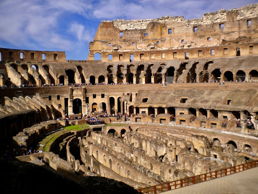 Colosseum interior crowded with tourists midday Rome