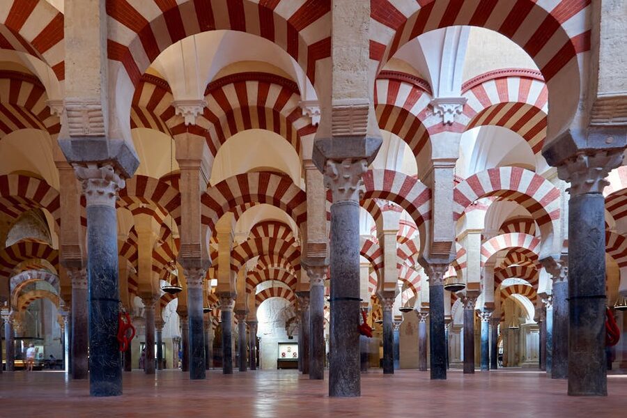 Cordoba Mezquita columns and double arches receding into the distance