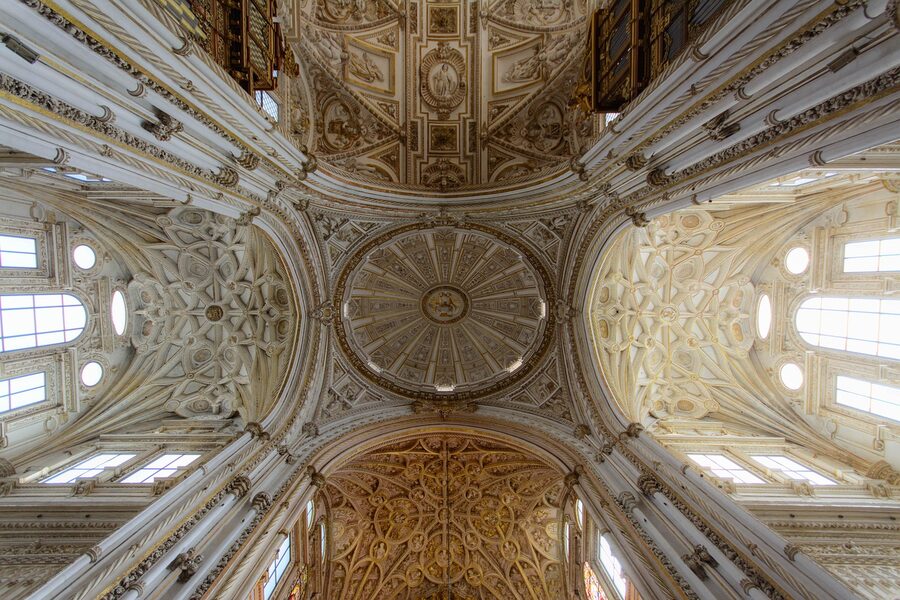 Looking through the Cordoba Mezquita columns toward the cathedral nave