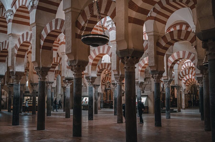Cordoba Mezquita prayer hall showing the famous red and white double arches