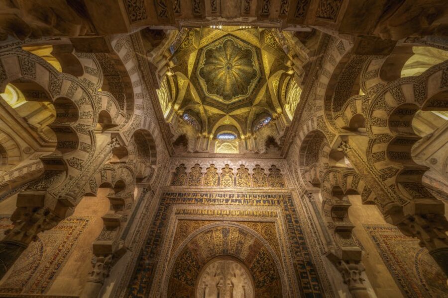 Elaborate arches and Mudejar decoration inside the Cordoba Mezquita