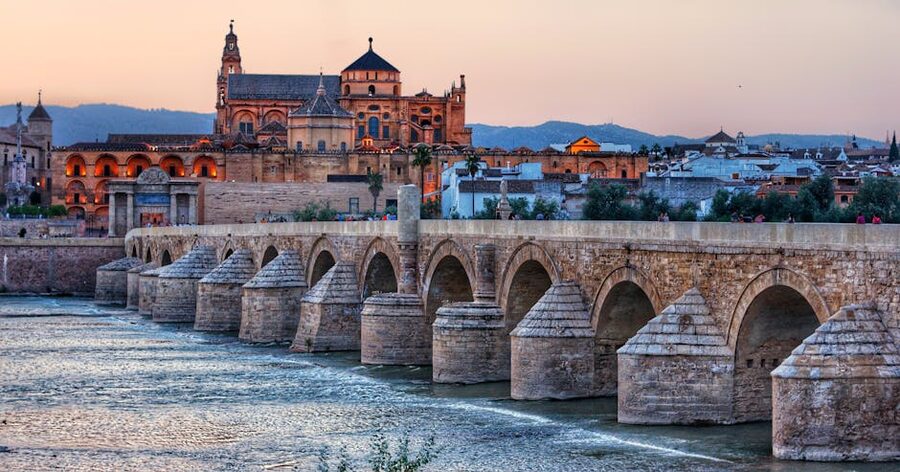 Cordoba Roman Bridge and Mosque-Cathedral in evening light from across the Guadalquivir