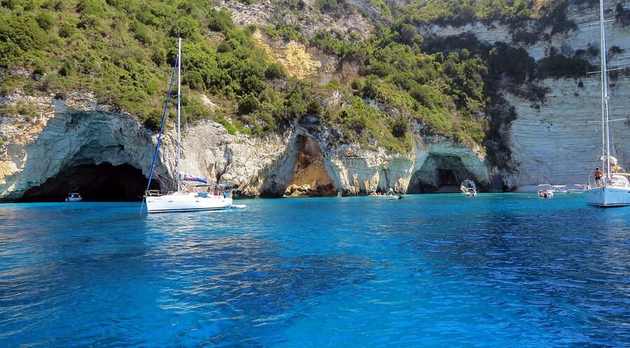 Antipaxos cliff blue sea cruise boat