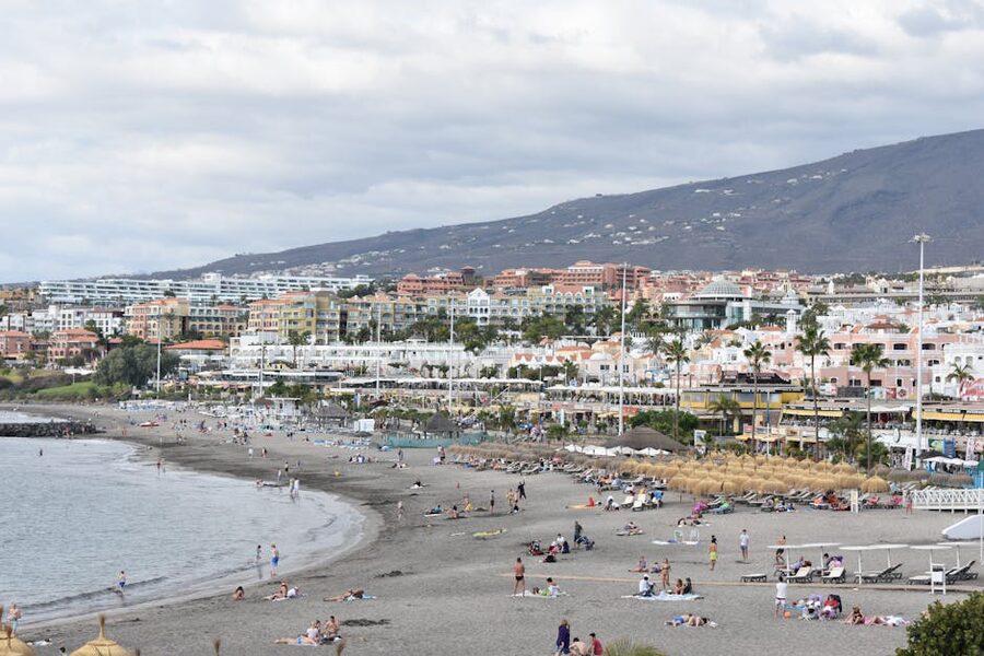 Playa de Fañabé beach at Costa Adeje, Tenerife with sun loungers