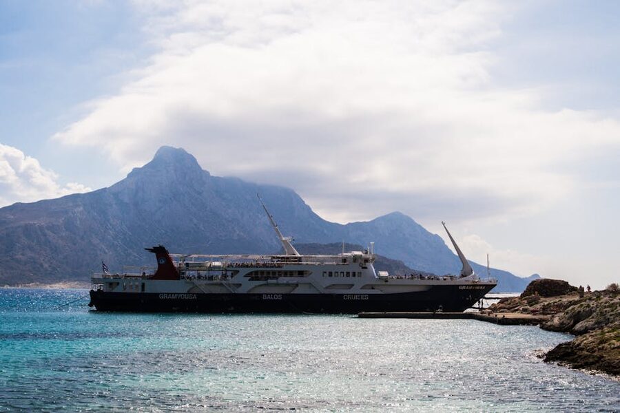 Ferry docked Balos beach Crete mountainous backdrop