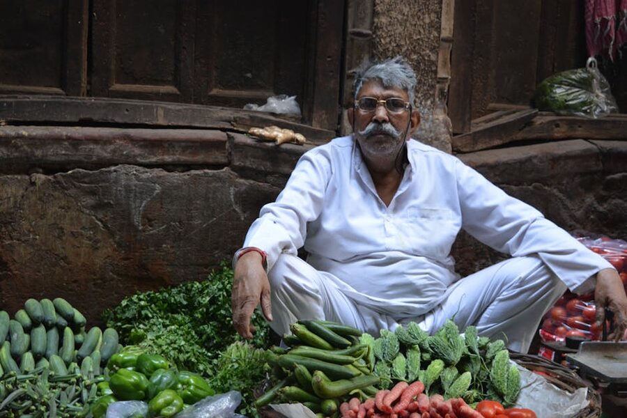 Food vendor preparing dishes in Old Delhi