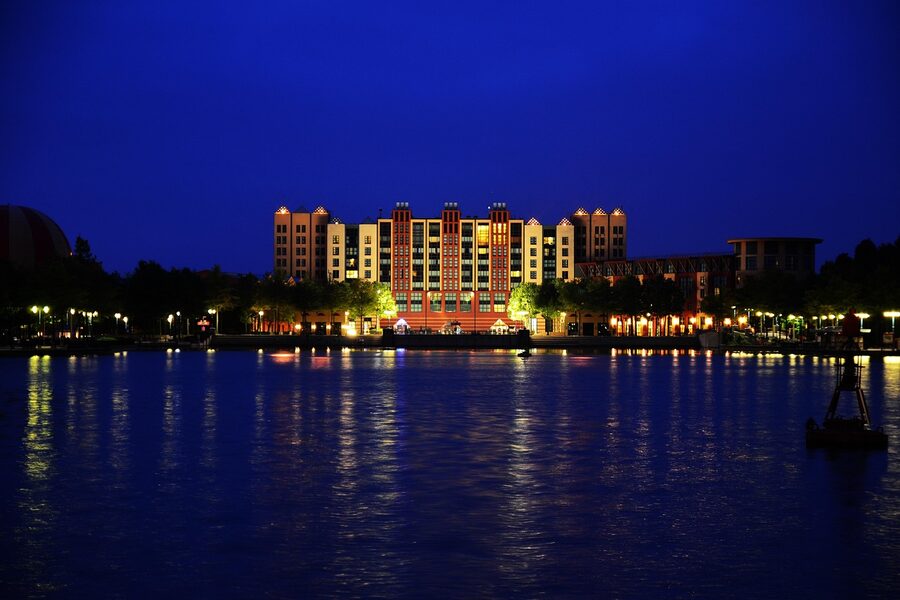 Disneyland Paris Hotel New York reflected in the lake at Lake Disney