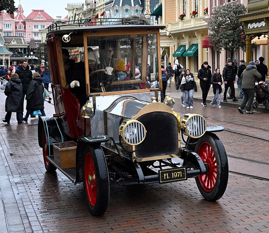 Main Street vehicle limousine driving down Main Street USA at Disneyland Paris