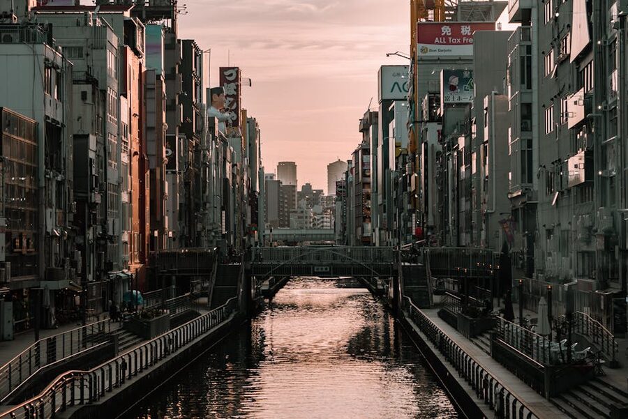 Bridge and buildings over Dotonbori Canal in Osaka