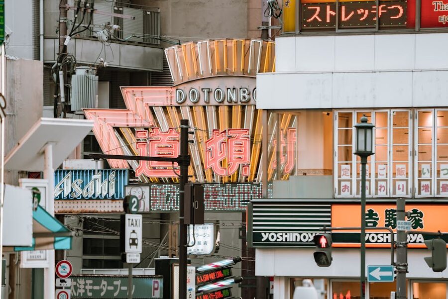 Street signs and restaurants along Dotonbori in Osaka