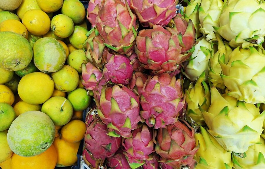 Dragon fruits and tropical fruits at a Vietnamese market