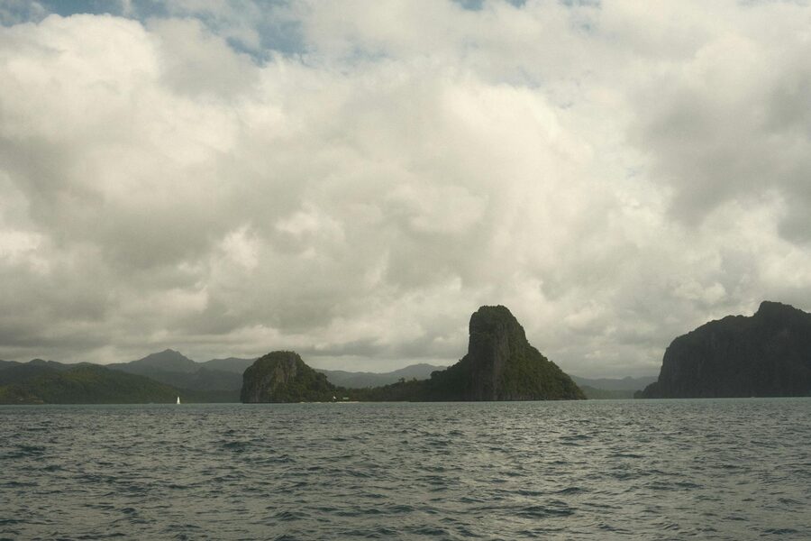 Majestic islands under a dramatic cloudy sky in El Nido