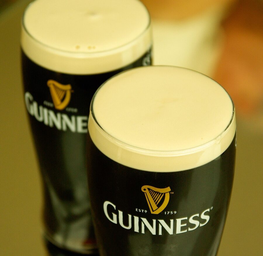 Pint of Guinness with shamrock drawn in the foam Dublin