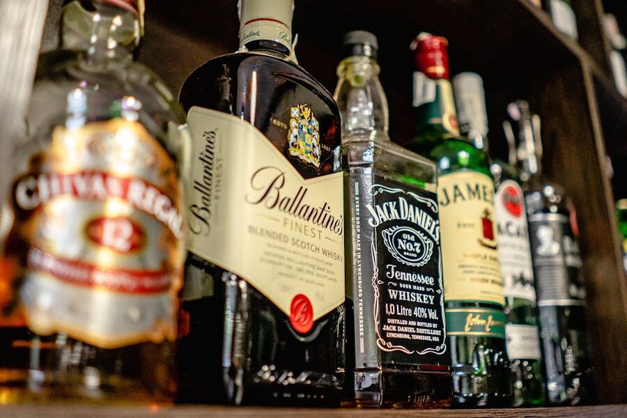 Whiskey bottles on a bar shelf Dublin