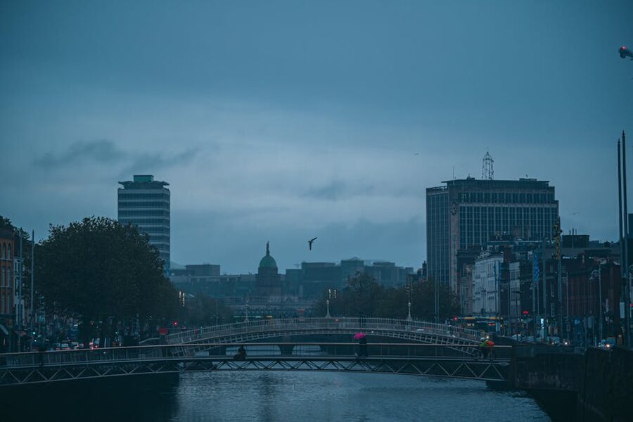 The Ha'penny Bridge over the River Liffey in Dublin at dusk