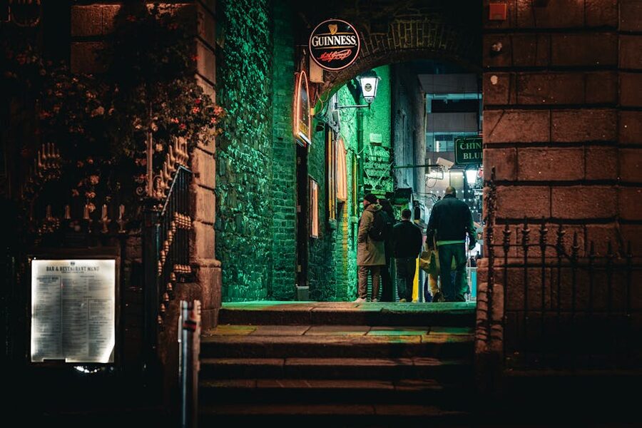 The neon-lit Temple Bar district in Dublin at night