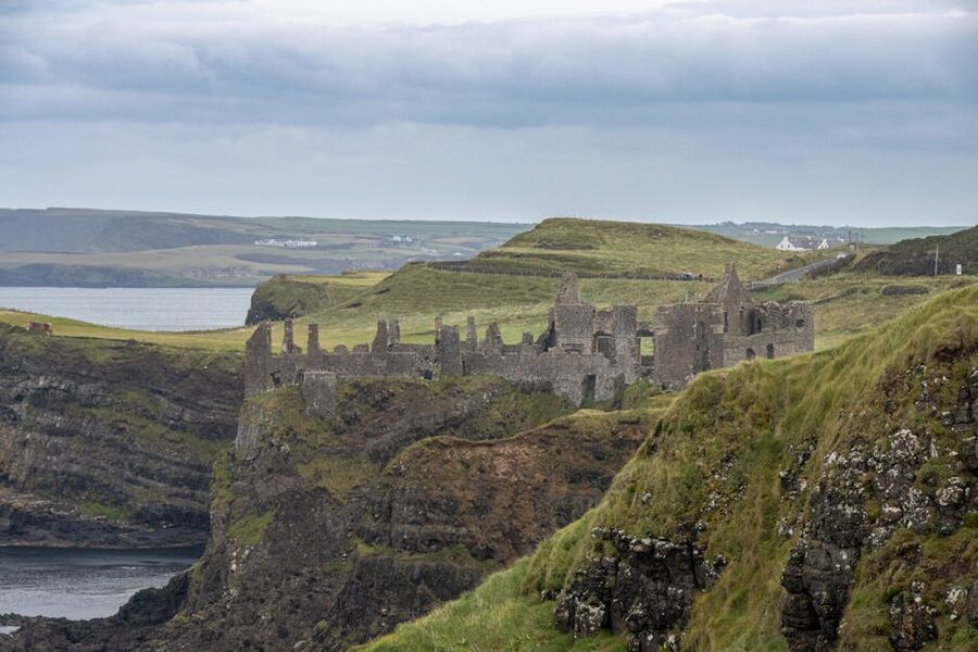 Dunluce Castle ruins on rugged cliffs Ballintoy