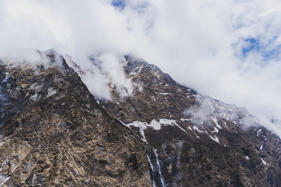 Dramatic Himalayan peak with clouds in the Nepal mountains