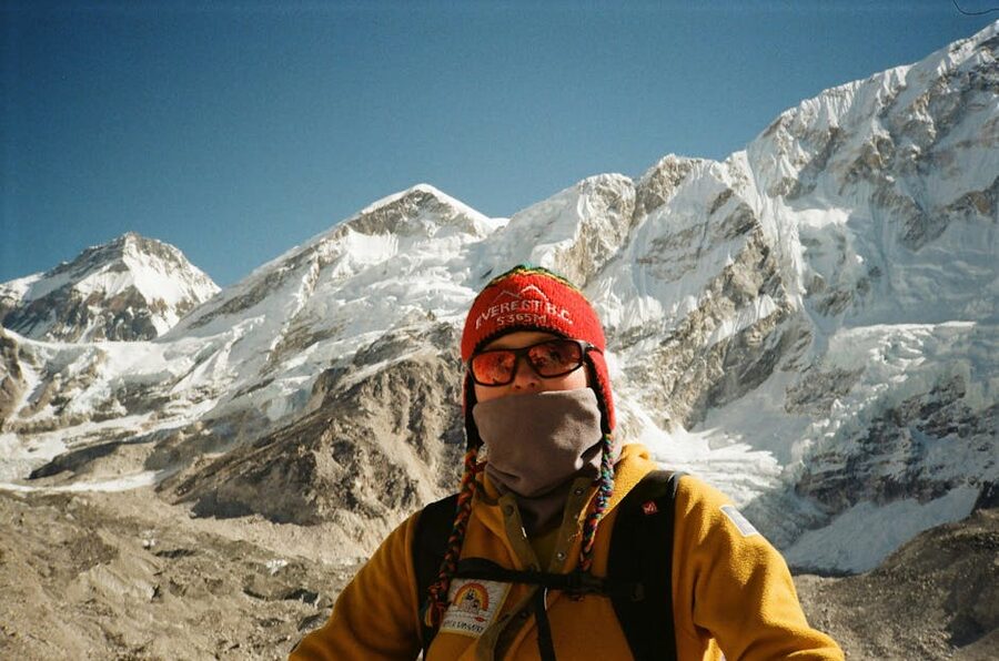 Trekker in warm gear near Namche Bazaar Nepal