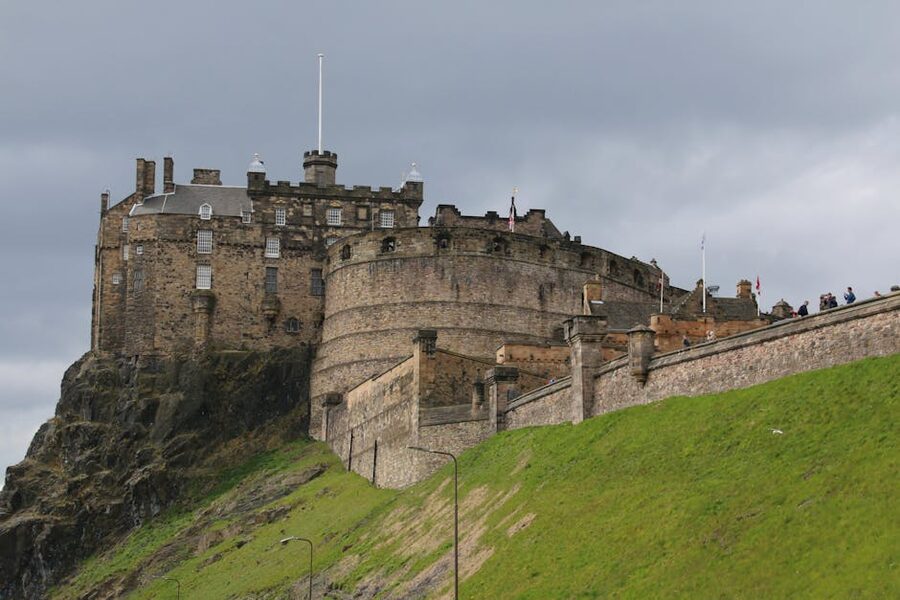 Edinburgh Castle under dramatic cloudy sky
