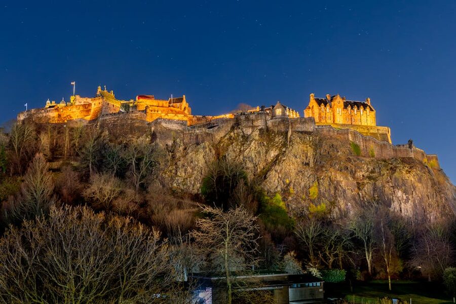 Edinburgh Castle at night under a starry sky