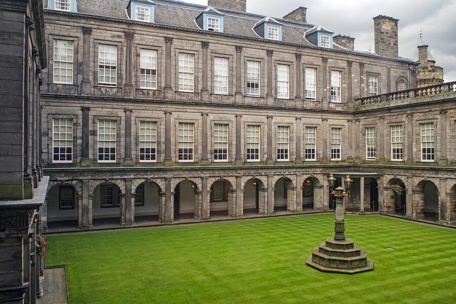 Holyrood Palace side view with Salisbury Crags Edinburgh