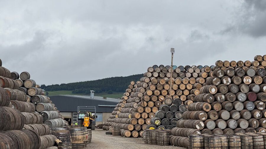 Whisky barrels stacked in Dufftown Scotland