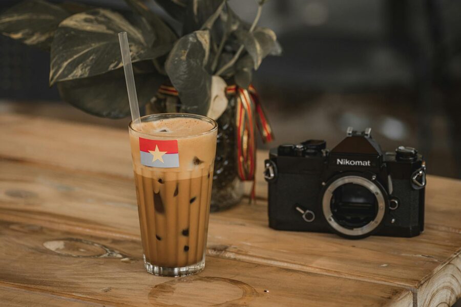 Vietnamese egg coffee with a thick whipped egg yolk foam on top of black coffee