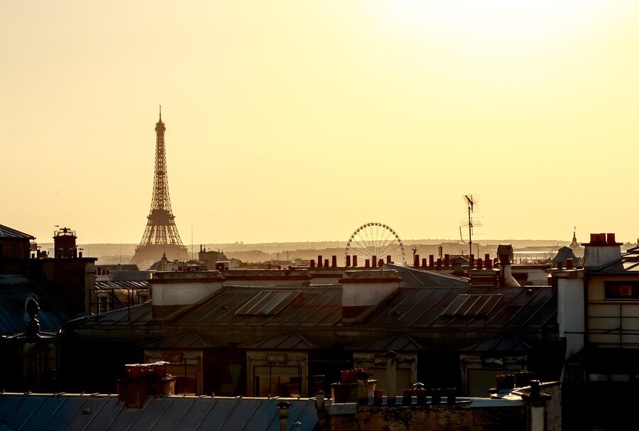 Paris rooftops and Eiffel Tower at sunset