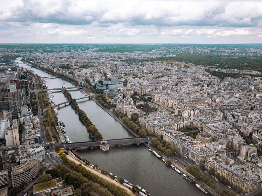Paris aerial view with Seine River and city landmarks