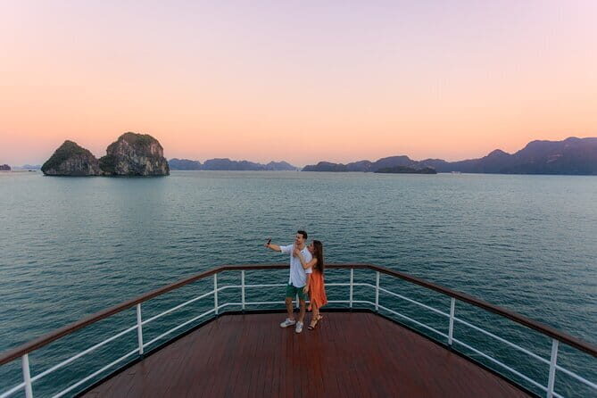 Emeraude Cruise 2 days 1 night Ha Long Bay Tour - Day 2: Exploring Caves, Sunrise Yoga, and the Return