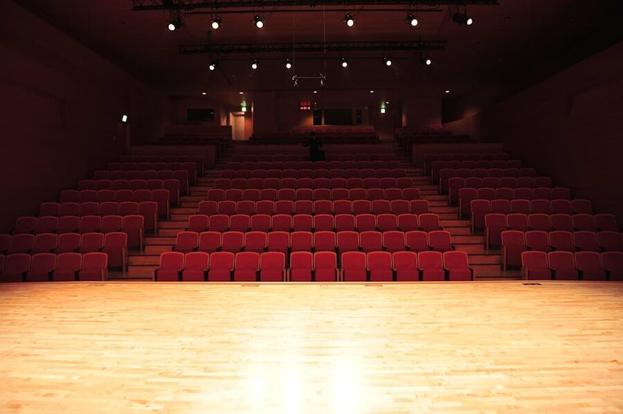 Empty theater with illuminated stage before a Tokyo dinner show