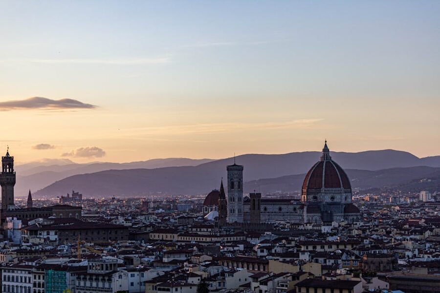 Florence skyline at sunset showing Duomo and Tuscan hills