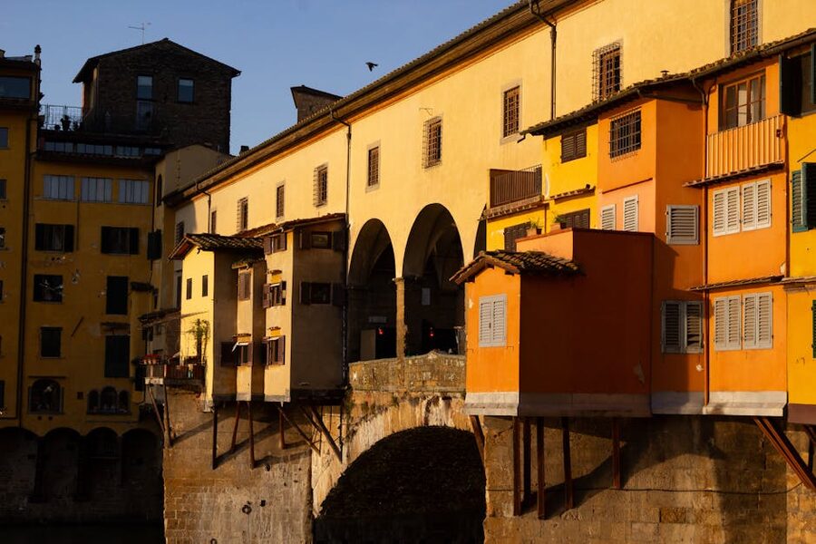 Ponte Vecchio facades at golden hour