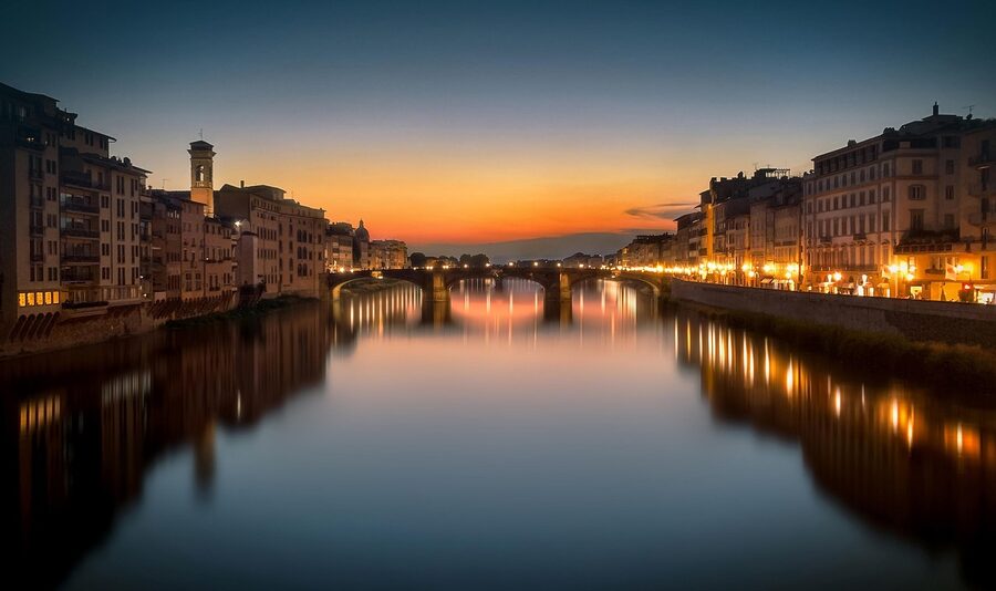 Arno river bridge at sunset in Florence Italy