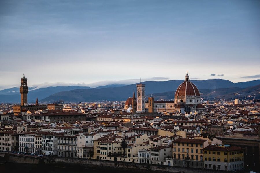 Aerial view of Florence with Duomo and Palazzo Vecchio at sunset