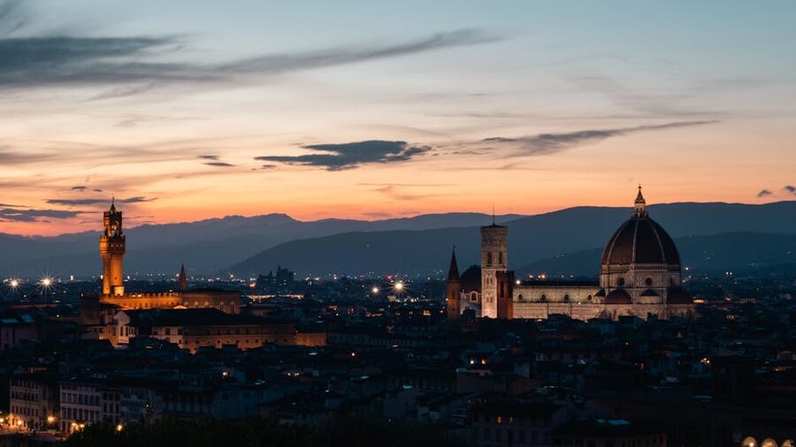 Florence Duomo and Palazzo Vecchio glowing at sunset