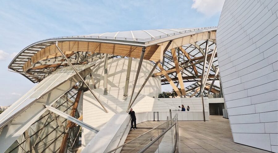 Fondation Louis Vuitton modern architecture against a clear Paris sky